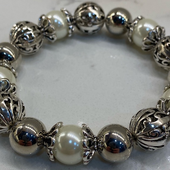 Scroll bracelet. Never worn. Retailed for $28. Asking $22. - Picture 2 of 6